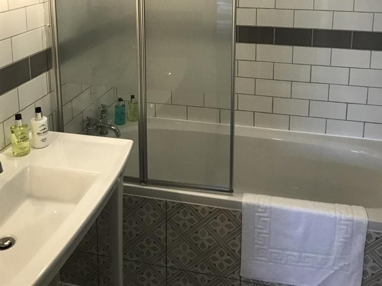 No.16 Hotel Seaham Kültér fotó A shower enclosure with a sliding door